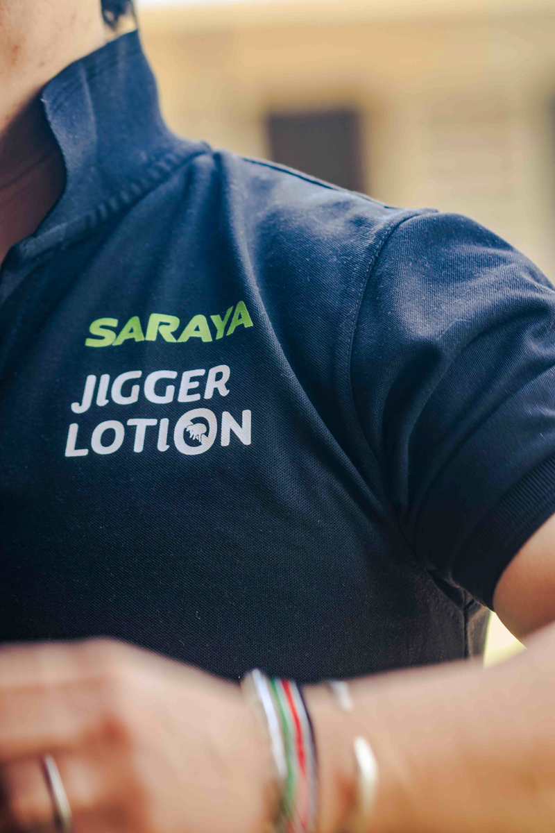 SARAYA Shirt with the JIgger Lotion mark used by the staff and local doctors